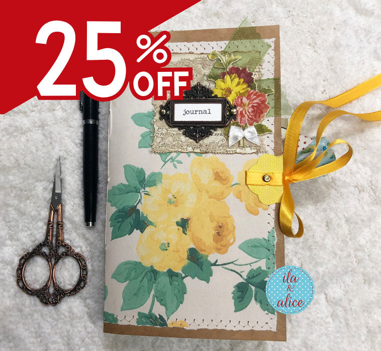 Floral journal with decorative elements and a 25% off label on a textured surface.