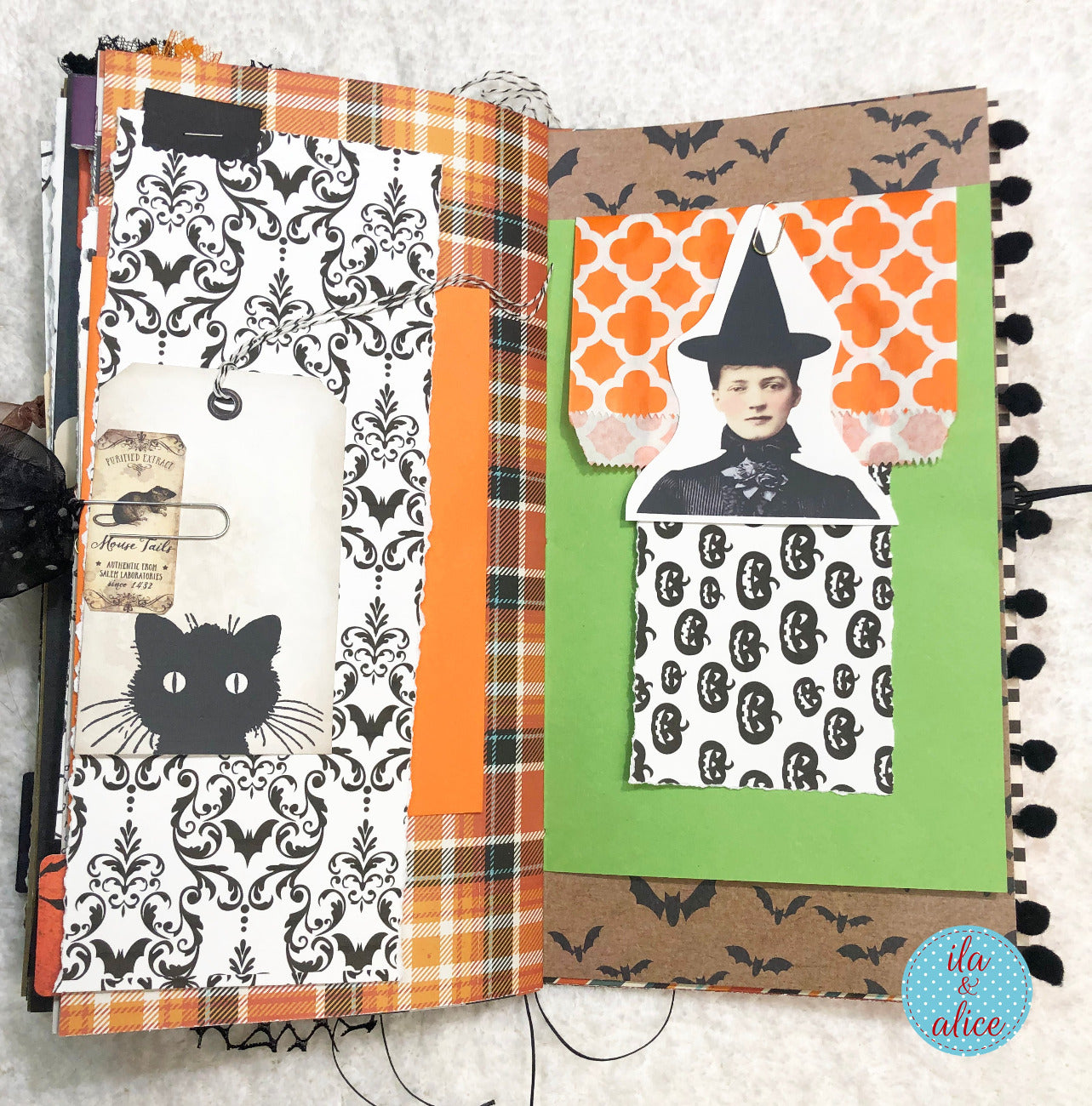 Handmade made Halloween junk journal  with Halloween-themed scrapbook page with black cat, plaid patterns, and vintage-style image.