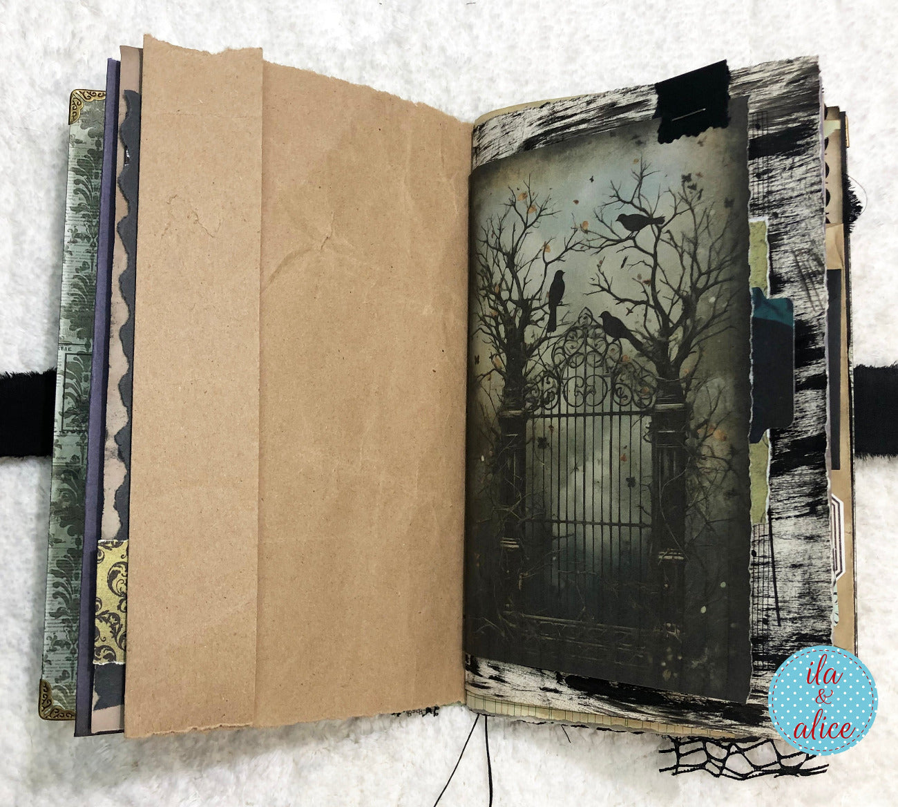 Handmade Eerie Halloween Gothic junk journal  with a dark, artistic illustration of a gate and trees on a textured white background