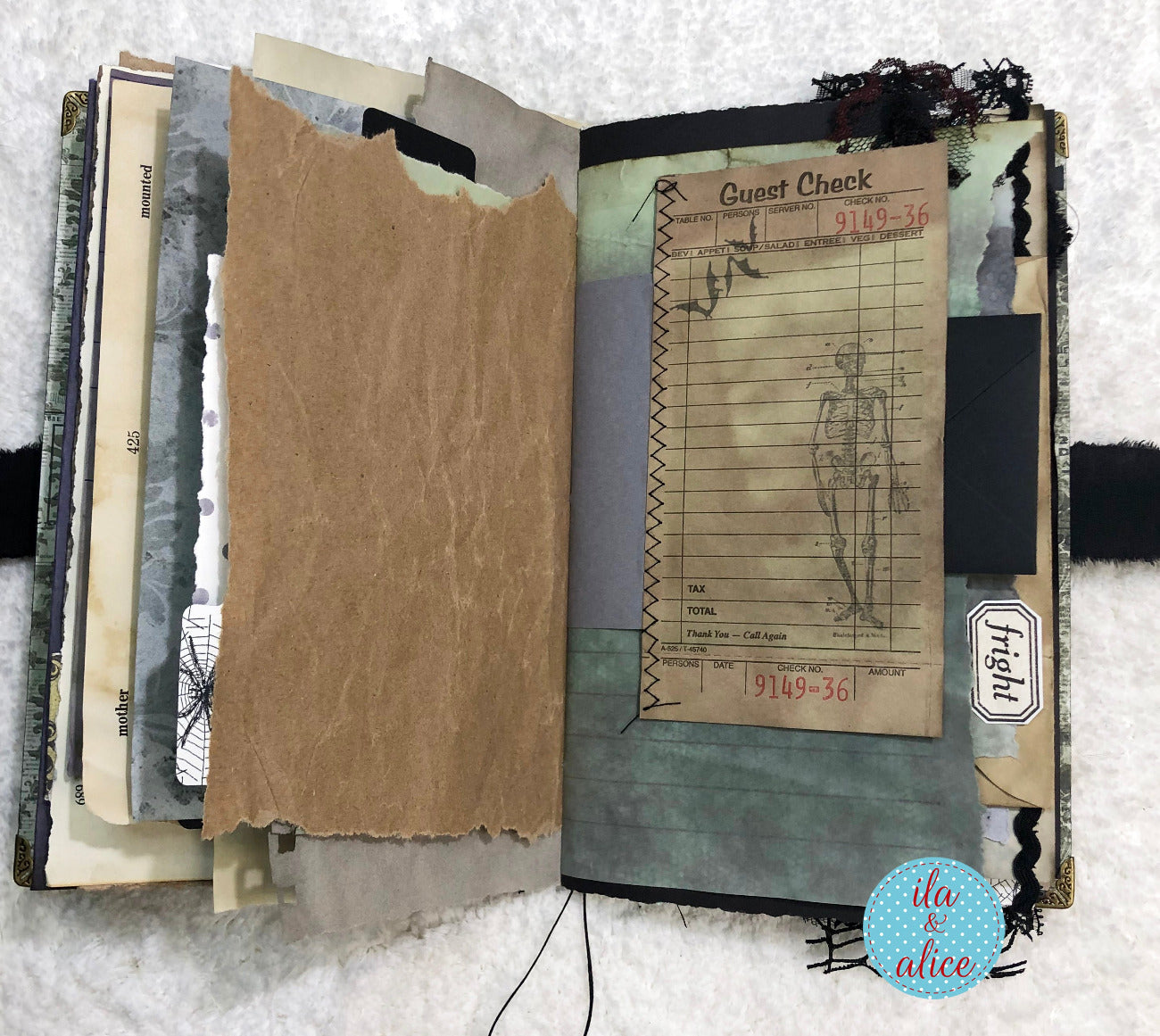 Handmade Eerie Halloween Gothic junk journal  with textured pages and vintage-style design elements on a white background.