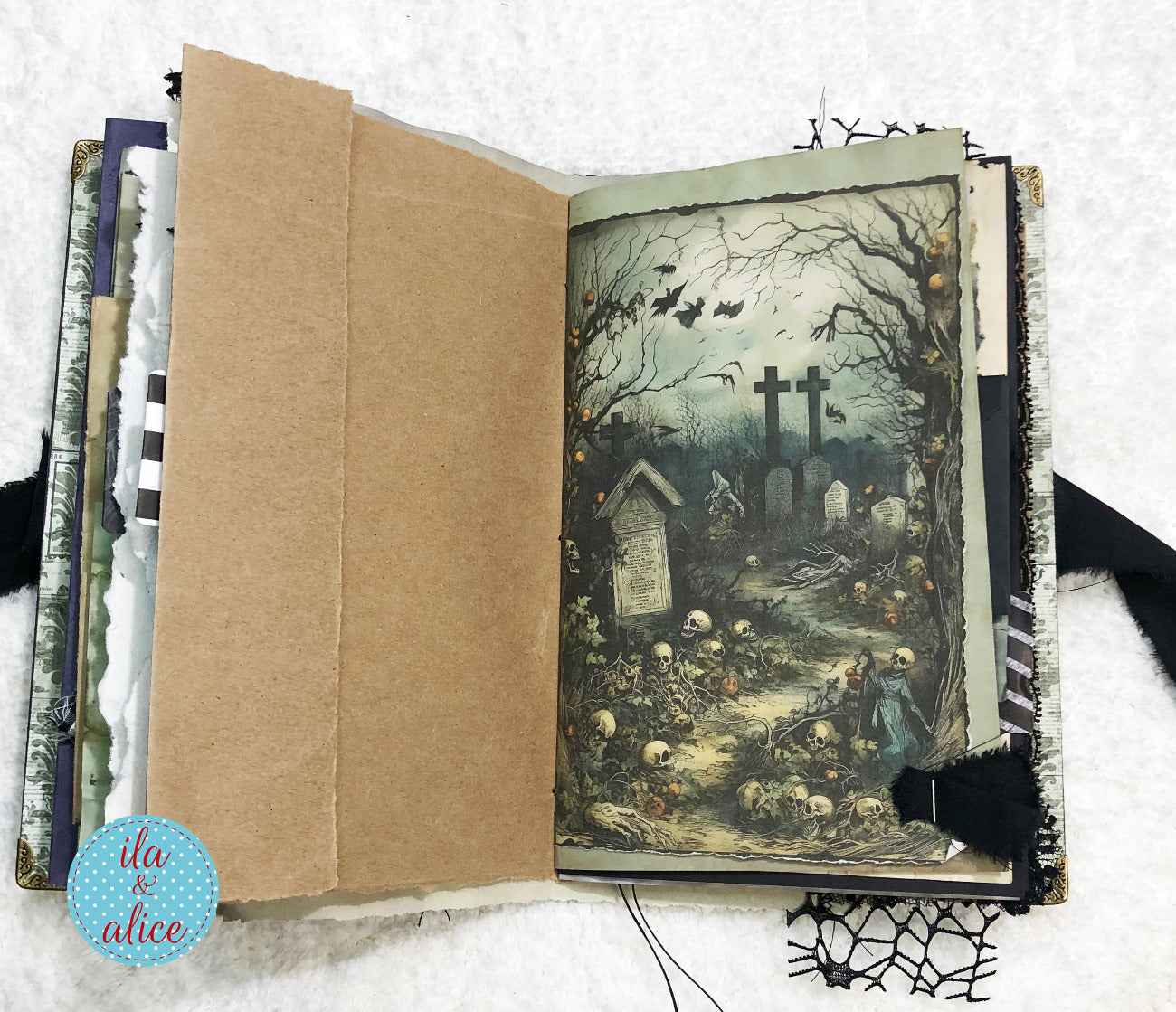 Handmade Eerie Halloween Gothic junk journal  with a Halloween-themed illustration of a graveyard on a white background.