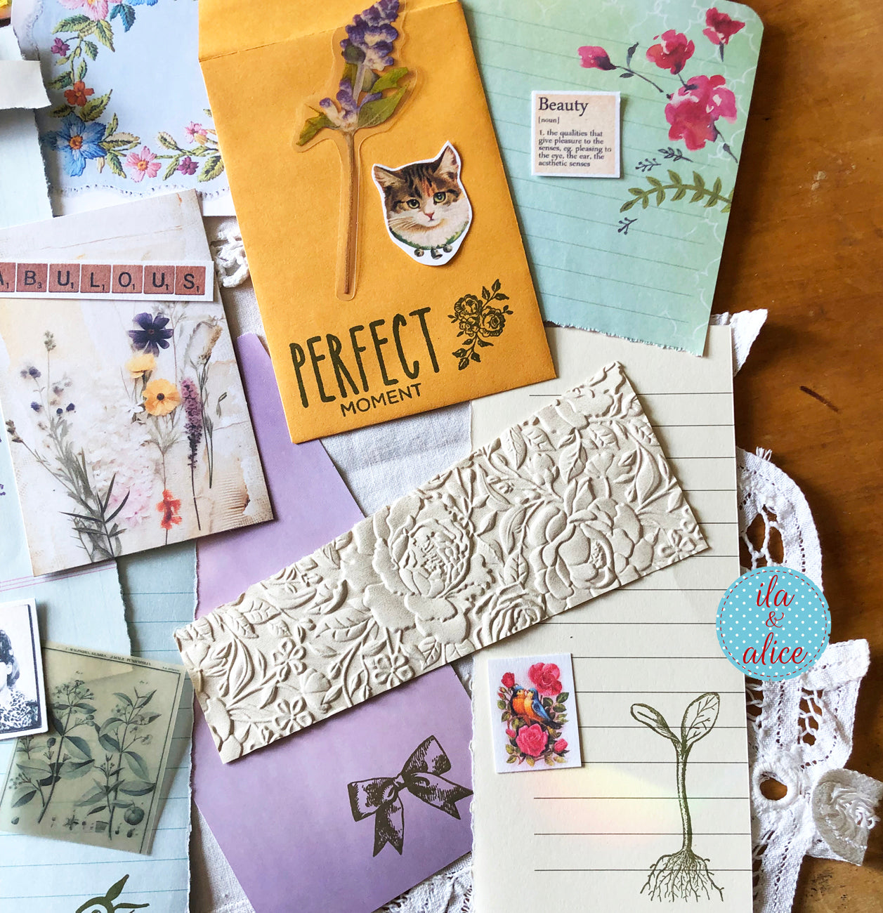 Curated junk journal ephemera pack with layered papers, botanical elements, and tuck-able pieces. Vintage pieces of ephemera and vintage book pages included.