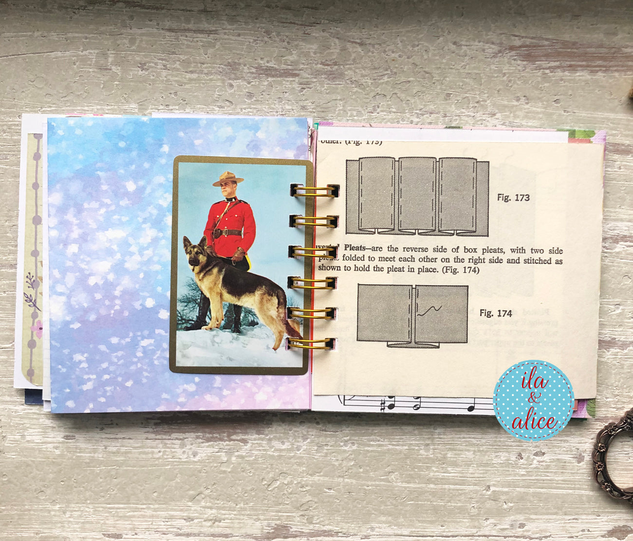 Handmade mini journal inside pages with vintage and vintage-inspired papers
